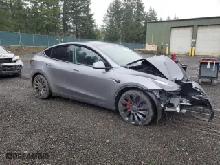 2025 Tesla Model Y Performance with VIN 7SAYGDEF2SF232223, listed as a Copart auction lot 50419235 with 0 mi miles and Salvage Title. Bid and sale history available at carsss.com. Image 4.