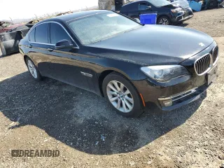 2015 BMW 7 Series 740i with VIN WBAYA6C5XFD826895, listed as a Copart auction lot 66889794 with Not Provided miles and Salvage Title. Bid and sale history available at DreamBid. Image 4.