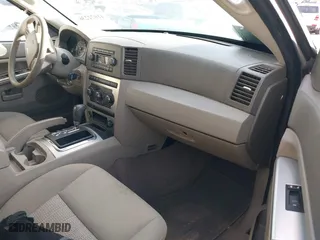 2007 Jeep Grand Cherokee Laredo with VIN 1J8GS48K77C515424, listed as a IAAI auction lot 41072236 with 263,248 mi miles. Bid and sale history available at carsss.com. Image 5.
