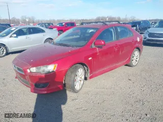 2010 Mitsubishi Lancer GTS with VIN JA32X8HW7AU019939, listed as a IAAI auction lot 41702699 with 96,623 mi miles. Bid and sale history available at carsss.com. Image 2.