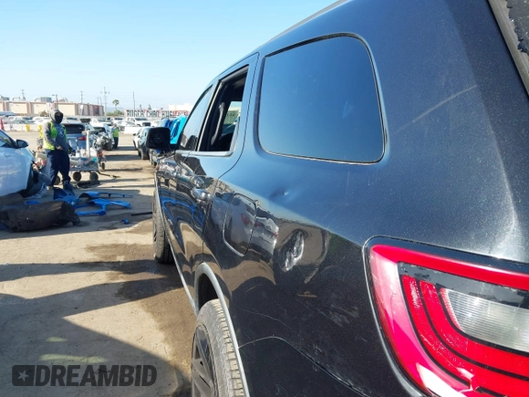 2015 Dodge Durango Limited with VIN 1C4RDHDG0FC200823, listed as a IAAI auction lot 42262387 with 127,442 mi miles and . Bid and sale history available at DreamBid. Image 6.