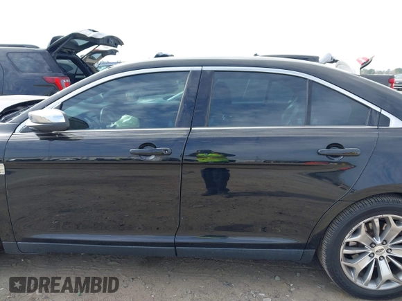 2016 Ford Taurus Limited with VIN 1FAHP2F8XGG130950, listed as a IAAI auction lot 41833038 with 128,536 mi miles and . Bid and sale history available at DreamBid. Image 15.