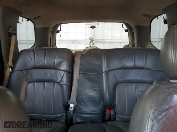 2002 GMC Envoy SLT with VIN 1GKDS13S822460095, listed as a Copart auction lot 77004764 with 267,716 mi miles and Salvage Title. Bid and sale history available at carsss.com. Image 10.