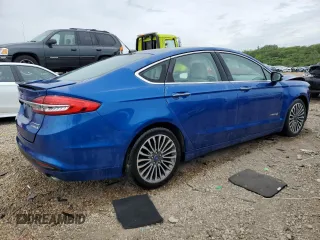 2017 Ford Fusion Hybrid Titanium with VIN 3FA6P0RU1HR138725, listed as a Copart auction lot 56650625 with 77,331 mi miles and Salvage title. Bid and sale history available at DreamBid. Image 3.
