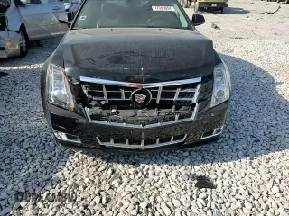 2013 Cadillac CTS Premium with VIN 1G6DS5E35D0149394, listed as a Copart auction lot 77005854 with 92,197 mi miles and Salvage title. Bid and sale history available at DreamBid. Image 11.