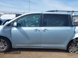 2015 Toyota Sienna XLE with VIN 5TDYK3DC3FS609947, listed as a IAAI auction lot 42097199 with Not provided miles and . Bid and sale history available at DreamBid. Image 15.