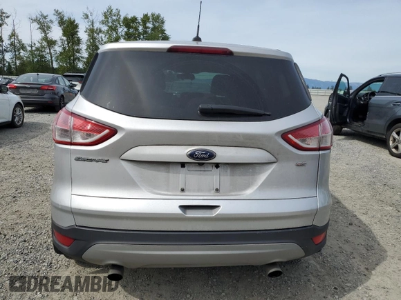 2015 Ford Escape SE with VIN 1FMCU0G74FUA63278, listed as a Copart auction lot 56005435 with 121,836 mi miles and Clean Title. Bid and sale history available at DreamBid. Image 6.