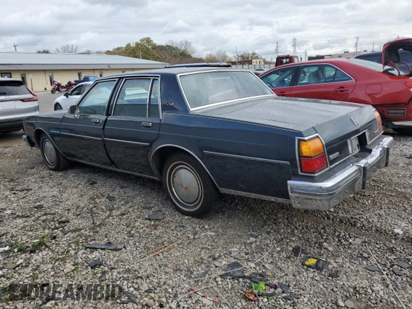 1985 Oldsmobile Delta Royale z VIN 1G3BN69YXF9080322, wystawiony jako Copart lot #78670094 z przebiegiem 58 231 mil mil oraz Tytuł czysty. Historia ofert i sprzedaży dostępna na DreamBid. Obrazek 2.
