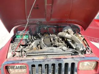 1992 Jeep Wrangler with VIN 2J4FY29S1NJ527182, listed as a Copart auction lot 71387974 with 228,406 mi miles and Clean Title. Bid and sale history available at carsss.com. Image 11.