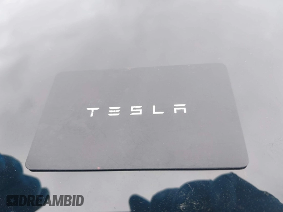 2023 Tesla Model Y Long Range with VIN 7SAYGDEE6PF824173, listed as a IAAI auction lot 41728613 with Not Provided miles and . Bid and sale history available at DreamBid. Image 11.