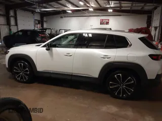 2023 Mazda CX-50 S Premium Plus with VIN 7MMVABEMXPN139186, listed as a IAAI auction lot 41289690 with 26,556 mi miles and . Bid and sale history available at DreamBid. Image 14.