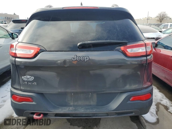 2014 Jeep Cherokee Trailhawk with VIN 1C4PJMBB2EW137916, listed as a Copart auction lot 44961445 with 119,145 mi miles and Salvage Title. Bid and sale history available at carsss.com. Image 6.