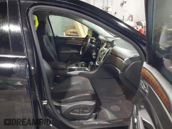 2012 Cadillac SRX Performance Collection z VIN 3GYFNEE37CS630391, wystawiony jako IAAI lot #42280516 z przebiegiem 137 330 mil mil oraz . Historia ofert i sprzedaży dostępna na DreamBid. Obrazek 5.