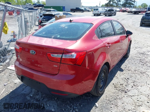 2015 Kia Rio LX with VIN KNADM4A33F6427021, listed as a IAAI auction lot 42011458 with 184,738 mi miles. Bid and sale history available at carsss.com. Image 4.