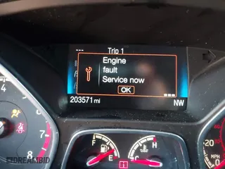 2015 Ford Focus ST with VIN 1FADP3L98FL207998, listed as a IAAI auction lot 41880849 with 203,571 mi miles. Bid and sale history available at carsss.com. Image 16.