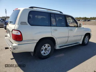 2000 Lexus LX 470 z VIN JT6HT00W1Y0096061, wystawiony jako Copart lot #52499155 z przebiegiem 199 914 mil mil oraz Tytuł czysty. Historia ofert i sprzedaży dostępna na DreamBid. Obrazek 3.