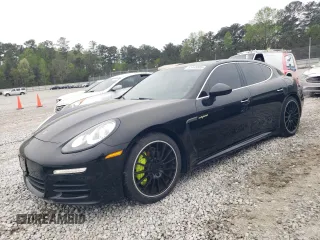 2015 Porsche Panamera S E-Hybrid z VIN WP0AD2A72FL040409, wystawiony jako Copart lot #51445505 z przebiegiem 112 238 mil mil oraz Tytuł czysty. Historia ofert i sprzedaży dostępna na DreamBid. Obrazek 1.