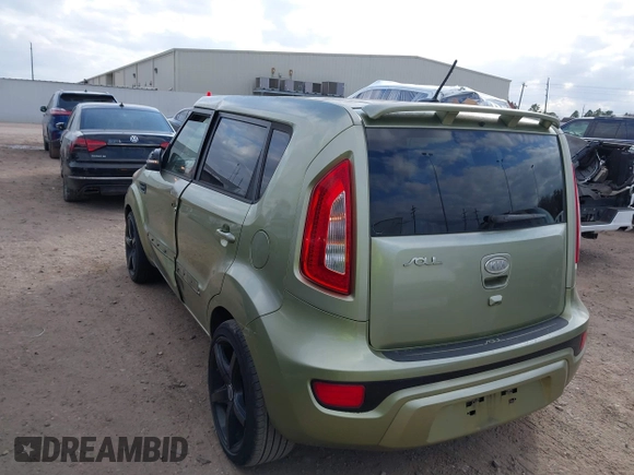 2012 Kia Soul + with VIN KNDJT2A69C7398380, listed as a IAAI auction lot 41523001 with 128,583 mi miles. Bid and sale history available at carsss.com. Image 3.