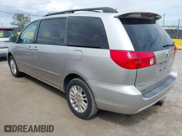 2009 Toyota Sienna XLE with VIN 5TDBK22C89S022909, listed as a IAAI auction lot 42139786 with 107,247 mi miles and . Bid and sale history available at DreamBid. Image 3.