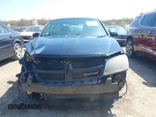 2013 Dodge Avenger SXT with VIN 1C3CDZCB0DN620279, listed as a IAAI auction lot 42094597 with 129,140 mi miles and . Bid and sale history available at DreamBid. Image 13.