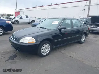 1998 Honda Civic LX with VIN JHMEJ6675WS002154, listed as a IAAI auction lot 41836717 with 150,025 mi miles. Bid and sale history available at carsss.com. Image 17.
