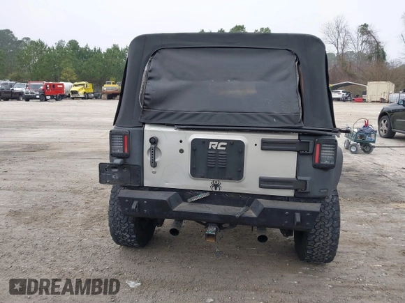 2007 Jeep Wrangler Unlimited X with VIN 1J4GA391X7L107424, listed as a IAAI auction lot 41752013 with 196,557 mi miles and . Bid and sale history available at DreamBid. Image 16.