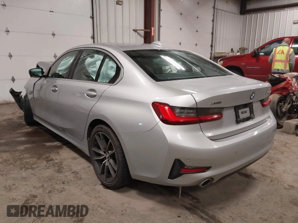 2019 BMW 3 Series 330i xDrive with VIN WBA5R7C53KAJ86493, listed as a IAAI auction lot 41559974 with 55,391 mi miles. Bid and sale history available at carsss.com. Image 3.