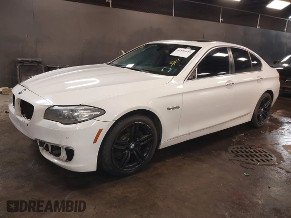 2014 BMW 5 Series 528i xDrive with VIN WBA5A7C57ED612230, listed as a IAAI auction lot 41586318 with 148,676 mi miles and . Bid and sale history available at DreamBid. Image 18.