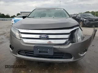 2012 Ford Fusion Hybrid z VIN 3FADP0L33CR211609, wystawiony jako Copart lot #60873005 z przebiegiem 144 474 mil mil oraz Szkoda całkowita • Salvage title. Historia ofert i sprzedaży dostępna na DreamBid. Obrazek 5.