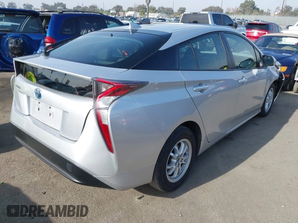 2016 Toyota Prius Two z VIN JTDKBRFU1G3016850, wystawiony jako IAAI lot #41163246 z przebiegiem 68 858 mil mil oraz . Historia ofert i sprzedaży dostępna na DreamBid. Obrazek 4.