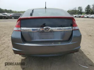 2012 Honda Insight z VIN JHMZE2H34CS006488, wystawiony jako Copart lot #54203575 z przebiegiem Nie podano mil oraz Szkoda całkowita • Salvage title. Historia ofert i sprzedaży dostępna na DreamBid. Obrazek 6.