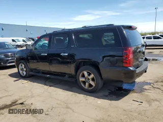 2008 Chevrolet Suburban LTZ z VIN 1GNFK16308R212830, wystawiony jako Copart lot #56477205 z przebiegiem 218 676 mil mil oraz Czysty tytuł • Clean title. Historia ofert i sprzedaży dostępna na DreamBid. Obrazek 2.