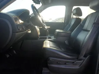 2013 Chevrolet Suburban LT with VIN 1GNSKJE73DR300736, listed as a Copart auction lot 48717835 with 216,599 mi miles and Salvage Title. Bid and sale history available at carsss.com. Image 7.