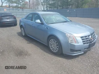 2013 Cadillac CTS Luxury z VIN 1G6DE5E58D0130850, wystawiony jako IAAI lot #42085332 z przebiegiem 38 160 mil mil oraz . Historia ofert i sprzedaży dostępna na DreamBid. Obrazek 1.