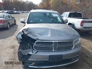 2014 Dodge Durango Citadel z VIN 1C4SDJET5EC509366, wystawiony jako IAAI lot #40735205 z przebiegiem 149 644 mil mil oraz . Historia ofert i sprzedaży dostępna na DreamBid. Obrazek 11.