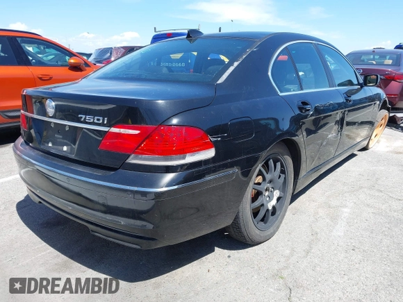 2006 BMW 7 Series 750i with VIN WBAHL83596DT05091, listed as a IAAI auction lot 41920423 with 154,651 mi miles and . Bid and sale history available at DreamBid. Image 4.