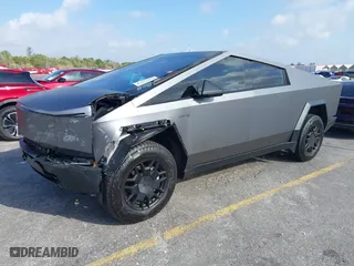 2024 Tesla Cybertruck with VIN 7G2CEHED2RA020185, listed as a IAAI auction lot 41673479 with 8,224 mi miles. Bid and sale history available at carsss.com. Image 2.