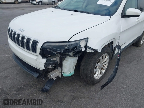 2020 Jeep Cherokee Latitude with VIN 1C4PJLCB5LD618650, listed as a IAAI auction lot 41634691 with 90,341 mi miles. Bid and sale history available at carsss.com. Image 6.