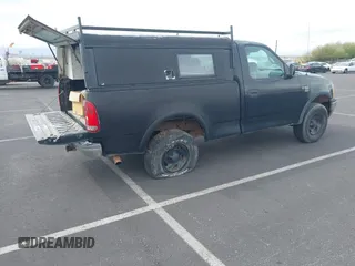 2000 Ford F-150 XL with VIN 2FTRF18W1YCA42685, listed as a IAAI auction lot 41743378 with 211,072 mi miles and . Bid and sale history available at DreamBid. Image 4.