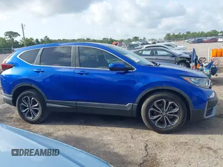 2021 Honda CR-V EX z VIN 7FARW1H59ME007732, wystawiony jako IAAI lot #42458601 z przebiegiem 60 034 mil mil oraz . Historia ofert i sprzedaży dostępna na DreamBid. Obrazek 14.