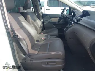 2015 Honda Odyssey Touring Elite with VIN 5FNRL5H9XFB121921, listed as a IAAI auction lot 41858551 with 61,506 mi miles. Bid and sale history available at carsss.com. Image 5.