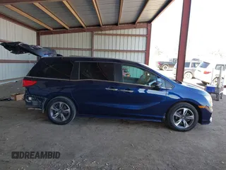 2020 Honda Odyssey Touring with VIN 5FNRL6H82LB015715, listed as a IAAI auction lot 41915849 with 69,603 mi miles and . Bid and sale history available at DreamBid. Image 14.