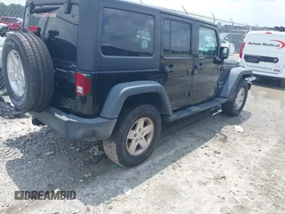 2017 Jeep Wrangler Unlimited Sport with VIN 1C4BJWDG6HL699547, listed as a IAAI auction lot 42652658 with 89,286 mi miles and . Bid and sale history available at DreamBid. Image 4.