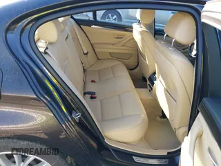 2014 BMW 5 Series 528i xDrive with VIN WBA5A7C54ED616297, listed as a IAAI auction lot 41877809 with 147,874 mi miles and . Bid and sale history available at DreamBid. Image 8.