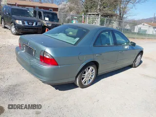 2003 Lincoln LS Sport with VIN 1LNHM87A33Y677386, listed as a IAAI auction lot 41890308 with 139,498 mi miles. Bid and sale history available at carsss.com. Image 4.