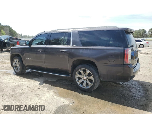 2015 GMC Yukon XL SLT with VIN 1GKS1HKC8FR551491, listed as a Copart auction lot 49183575 with 226,565 mi miles and Salvage Title. Bid and sale history available at carsss.com. Image 2.