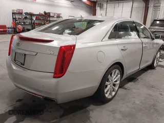 2016 Cadillac XTS Luxury Collection with VIN 2G61N5S38G9153304, listed as a IAAI auction lot 41837581 with 160,884 mi miles. Bid and sale history available at carsss.com. Image 4.