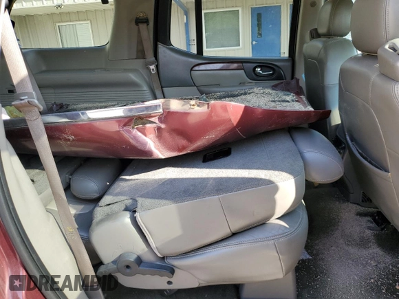 2003 GMC Envoy SLT z VIN 1GKET16S136186780, wystawiony jako Copart lot #55927155 z przebiegiem 163 099 mil mil oraz Szkoda całkowita • Salvage title. Historia ofert i sprzedaży dostępna na DreamBid. Obrazek 11.