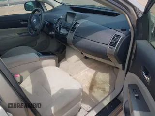 2007 Toyota Prius z VIN JTDKB20U073280948, wystawiony jako IAAI lot #42166258 z przebiegiem 236 628 mil mil oraz . Historia ofert i sprzedaży dostępna na DreamBid. Obrazek 5.