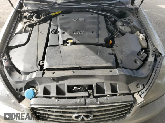 2003 Infiniti Q45 z VIN JNKBF01A03M101890, wystawiony jako Copart lot #86930994 z przebiegiem 158 134 mil mil oraz Szkody całkowita. Historia ofert i sprzedaży dostępna na DreamBid. Obrazek 13.